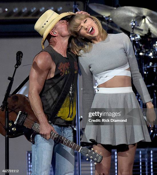 Kenny Chesney and Taylor Swift perform onstage during Kenny Chesney's The Big Revival 2015 Tour kick-off for a 55 show run through August. The...