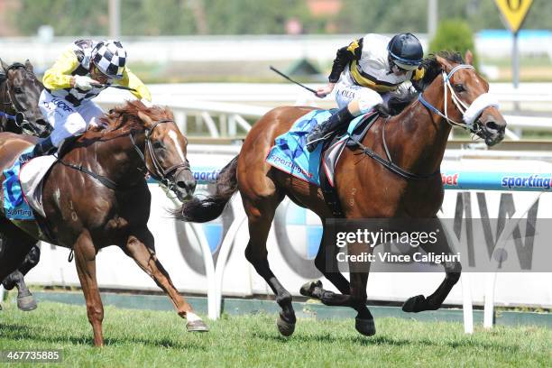 Luke Nolen riding Moment of Change defeats Damien Oliver riding Eurozone in Race 8, the Sportingbet C.F.Orr Stakes during Melbourne racing at...