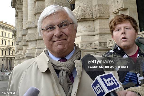 Amanda Knox 's lawyer Luciano Ghirga speaks to journalists as he arrives at the Italy's Supreme Court in Rome on March 27, 2015. The court today...