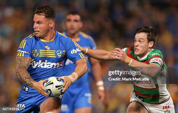 Anthony Watmough of the Eels looks to pass as Luke Keary of the Rabbitohs attempts to tackle during the round four NRL match between the Parramatta...