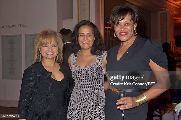 Guests and Carrie Mae Weems attend the Debra Lee Pre-Dinner the National Museum of Women in the Arts on February 7, 2014 in Washington, DC.