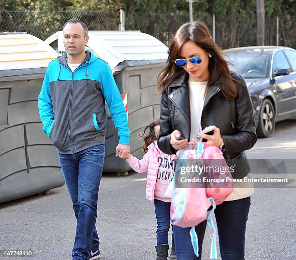 Barcelona football player Andres Iniesta, his wife Anna Ortiz and their daughter Valeria Ortiz are seen on March 09, 2015 in Barcelona, Spain.