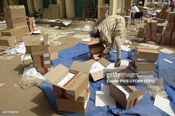 An officials sorts documents at the secretariat of Independent National Electoral Commission in Kano on March 27, 2015. President Goodluck Jonathan...