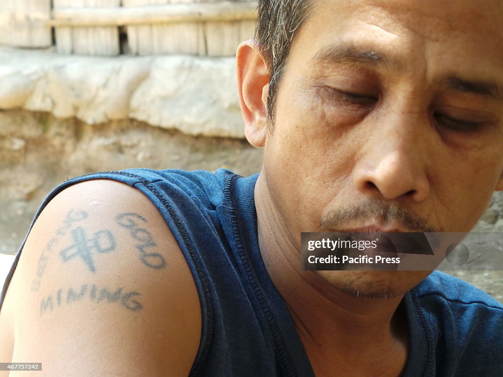 A 43 years old man with gold mining tattoo. He started...