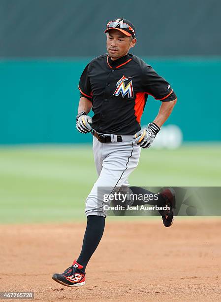 Ichiro Suzuki of the Miami Marlins warms up prior to the spring training game against the St. Louis Cardinals at Roger Dean Stadium on March 26, 2015...