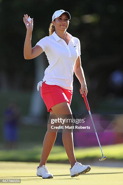 Cheyenne Woods of the United States acknowledges the crowd on the 18th green during day three of the 2014 Ladies Masters at Royal Pines Resort on...