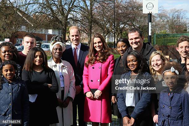 Prince William, Duke of Cambridge and Catherine, Duchess of Cambridge pose for a group photograph at the XLP Mobile recording Studio on March 27,...