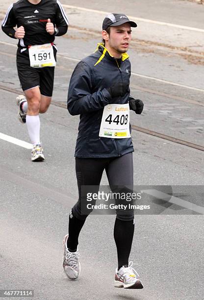 In this photo released today, co-pilot of Germanwings flight 4U9525 Andreas Lubitz participates in the Frankfurt City Half-Marathon on March 14, 2010...