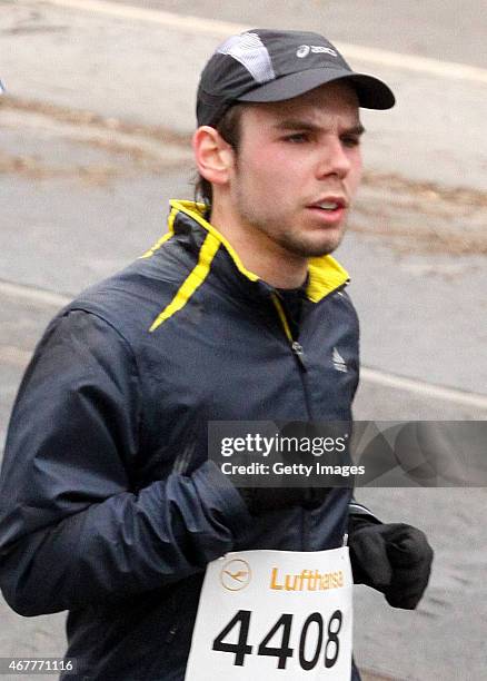 In this photo released today, co-pilot of Germanwings flight 4U9525 Andreas Lubitz participates in the Frankfurt City Half-Marathon on March 14, 2010...