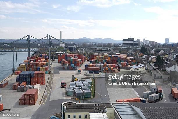 Rhine harbor and skyline Bonn with container storage.