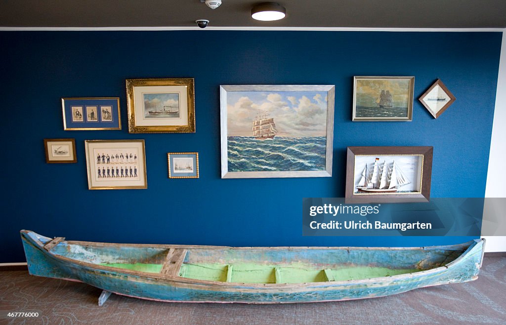 Motel One corridor, pictures, paintings, boat.