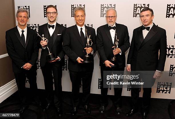 Film editors William Goldenberg, Crispin Struthers, Alan Baumgarten and Jay Cassidy and actor Steve Coogan pose with awards in the green room at the...