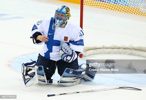 Noora Raty of Finland reacts against United States during the Women's Ice Hockey Preliminary Round Group A Game on day 1 of the Sochi 2014 Winter...