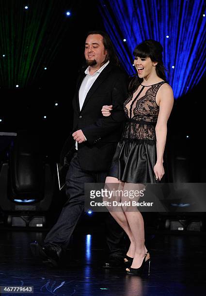 Austin "Chumlee" Russell from History's "Pawn Stars" television series and model Claire Sinclair present the Comeback of the Year award during the...