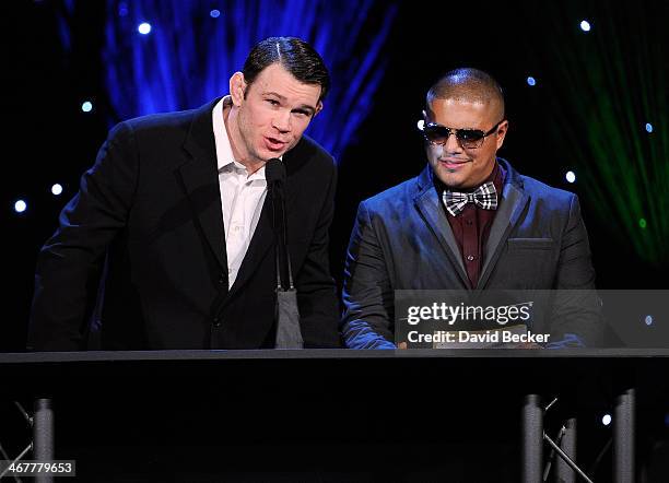 Hall of Famer Forrest Griffin and three-time world champion boxer Fernando Vargas present the Personality of the Year award during the sixth annual...