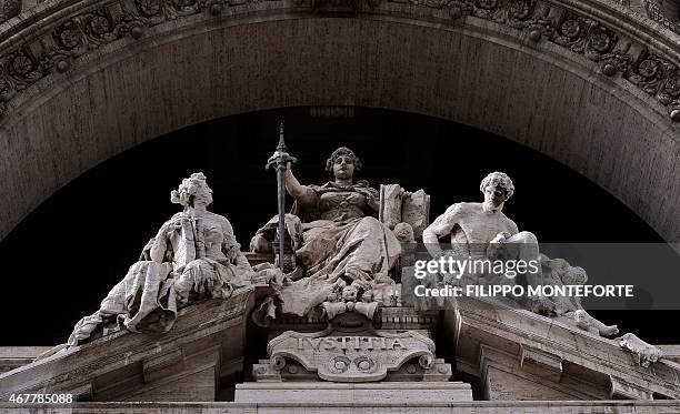 Picture shows a statue of Roman goddess Justitia at the Italian Supreme Court in downtown Rome on March 27, 2015. Judges at Italy's top court retired...