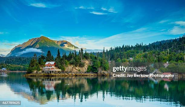 reflection in a reflection - houses of alaska stock pictures, royalty-free photos & images