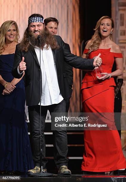 Personalities Willie Robertson and Korie Robertson speak on stage at the 22nd Annual Movieguide Awards Gala at the Universal Hilton Hotel on February...