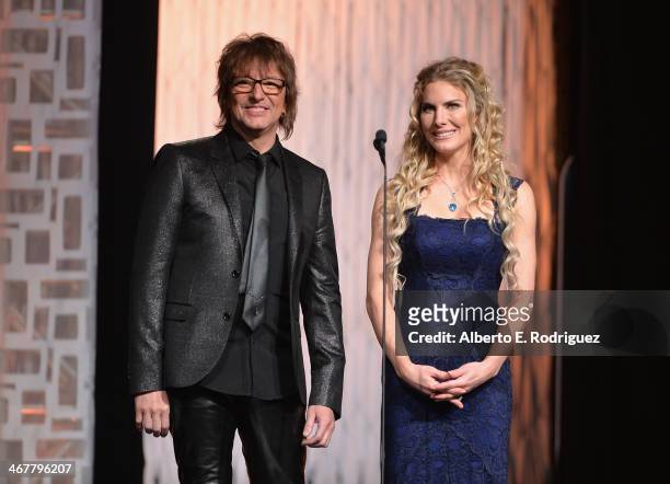Singer Richie Sambora and actress Kelly Greyson speak on stage at the 22nd Annual Movieguide Awards Gala at the Universal Hilton Hotel on February 7,...