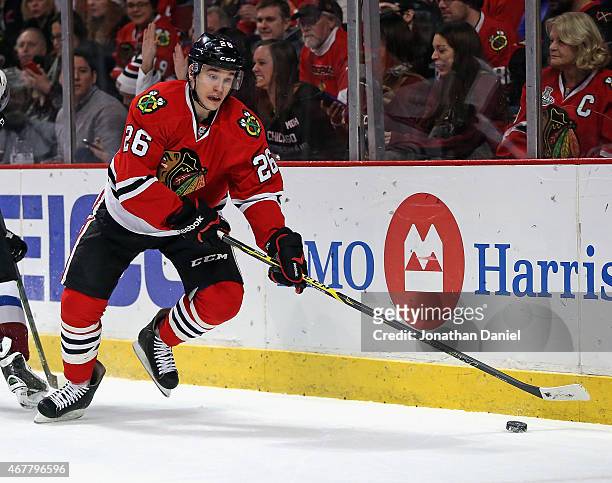 Kyle Cumiskey of the Chicago Blackhawks controls the puck against the Colorado Avalanche at the United Center on February 20, 2015 in Chicago,...