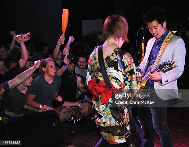 Mika Yoshimura of Bo-Peep and Kishi Bashi perform with Peelander-Z at Live Wire on March 26, 2015 in Athens, Georgia.