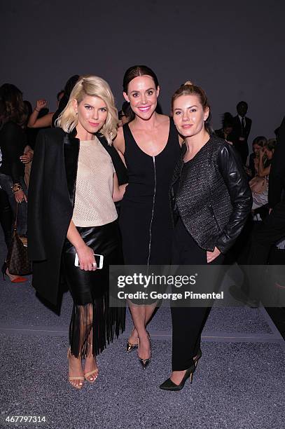 Lee-Ann Cuthbert, Tessa Virtue and Elisha Cuthbert attend World MasterCard Fashion Week Fall 2015 Collections Day 4 at David Pecaut Square on March...