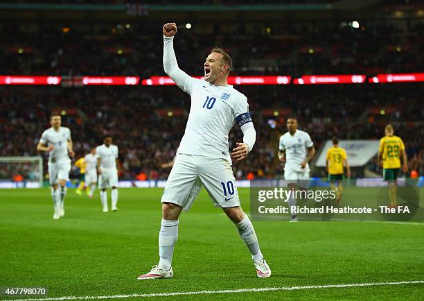 Wayne Rooney of England celebrates scoring the opening goal during the EURO 2016 Qualifier between England and Lithuania at Wembley Stadium on March...