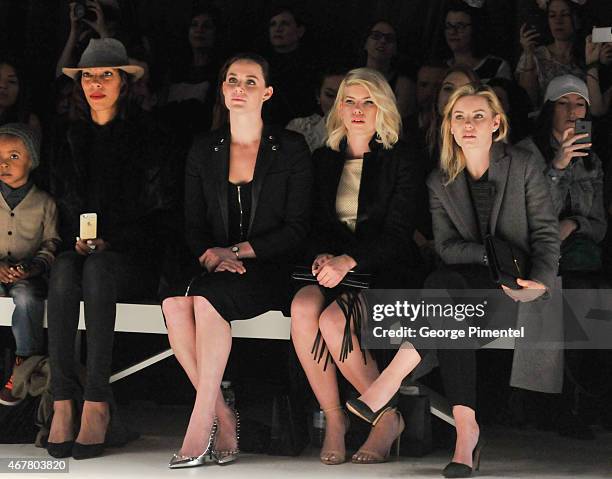 Tessa Virtue, Lee-Ann Cuthbert and Elisha Cuthbert attend World MasterCard Fashion Week Fall 2015 Collections Day 4 at David Pecaut Square on March...