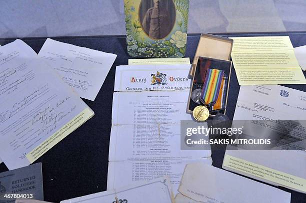 Picture taken on February 7, 2014 shows a World War I Army Orders letter from the British army with medals displayed at the War Museum of...