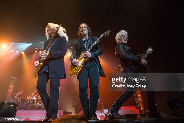 Bryan Hitt,Bruce Hall,Dave Amato, and Kevin Cronin of REO Speedwagon performs in concert at Emens Auditorium, Ball State University on February 7,...