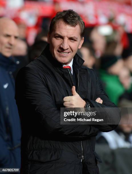 Liverpool Manager Brendan Rodgers gives a thumbs up prior to the Barclays Premier League match between Liverpool and Arsenal at Anfield on February...