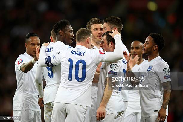 The England players celebrate during the EURO 2016 Qualifier match between England and Lithuania at Wembley Stadium on March 27, 2015 in London,...
