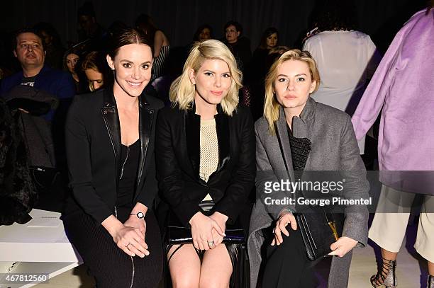 Tessa Virtue, Lee-Ann Cuthbert and Elisha Cuthbert attend World MasterCard Fashion Week Fall 2015 Collections Day 4 at David Pecaut Square on March...