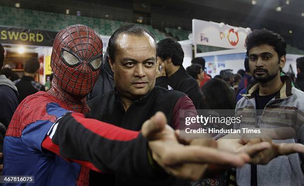 Author Joygopal Podder with comic character spiderman during a second day of the 4th Annual Indian Comic Con 2014 at Thayagaraj Stadium on February...