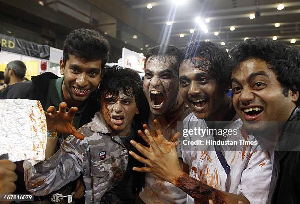 People enjoy during a second day of the 4th Annual Indian Comic Con 2014 at Thayagaraj Stadium on February 8, 2014 in New Delhi, India. The mega...