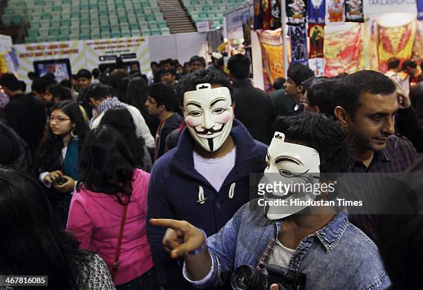 People enjoy during a second day of the 4th Annual Indian Comic Con 2014 at Thayagaraj Stadium on February 8, 2014 in New Delhi, India. The mega...