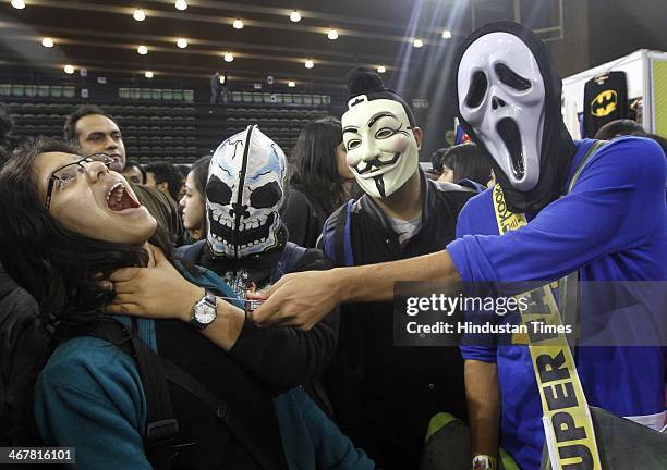 People enjoy during a second day of the 4th Annual Indian Comic Con 2014 at Thayagaraj Stadium on February 8, 2014 in New Delhi, India. The mega...