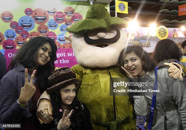 People enjoy during a second day of the 4th Annual Indian Comic Con 2014 at Thayagaraj Stadium on February 8, 2014 in New Delhi, India. The mega...