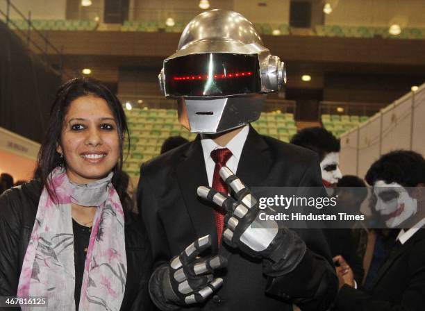 People enjoy during a second day of the 4th Annual Indian Comic Con 2014 at Thayagaraj Stadium on February 8, 2014 in New Delhi, India. The mega...