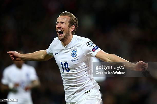 Harry Kane of England celebrates after scoring on his debut during the EURO 2016 Qualifier match between England and Lithuania at Wembley Stadium on...