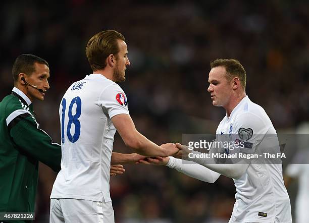 Harry Kane of England replaces Wayne Rooney of England during the EURO 2016 Qualifier between England and Lithuania at Wembley Stadium on March 27,...