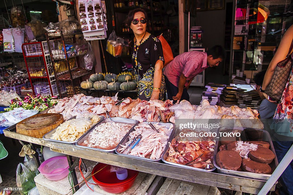 Selling raw meat at the market