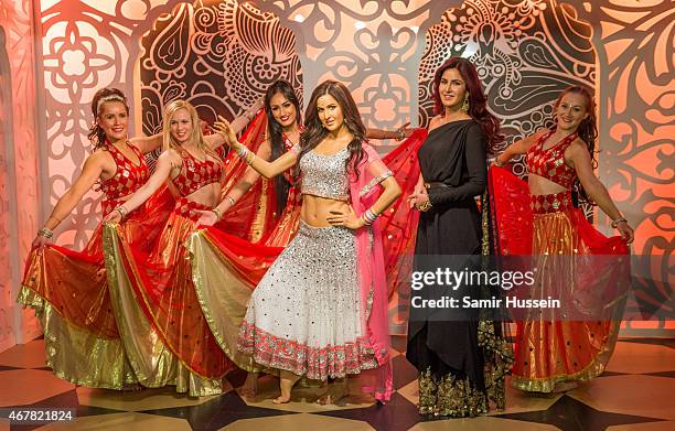 Katrina Kaif attends a photocall to unveil her new wax figure at Madame Tussauds on March 27, 2015 in London, England.