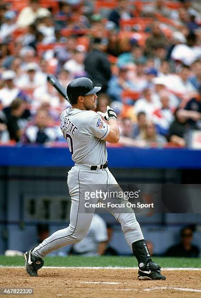 Dante Bichette of the Colorado Rockies bats against the New York Mets during an Major League Baseball game circa 1997 at Shea Stadium in the Queens...