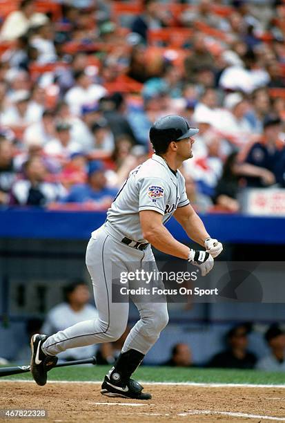 Dante Bichette of the Colorado Rockies bats against the New York Mets during an Major League Baseball game circa 1997 at Shea Stadium in the Queens...