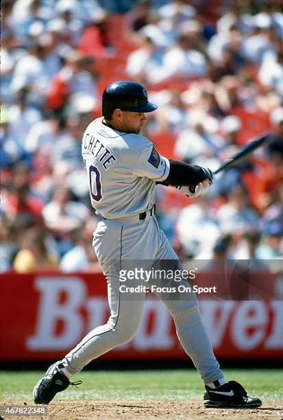 Dante Bichette of the Colorado Rockies bats against the San Francisco Giants during an Major League Baseball game circa 1994 at Candlestick Park in...