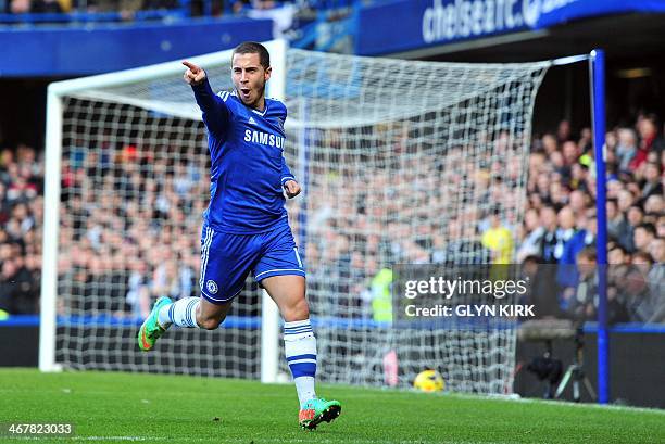 Chelsea's Belgian midfielder Eden Hazard celebrates scoring the opening goal during the English Premier League football match between Chelsea and...