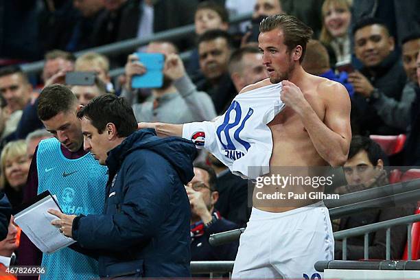 Harry Kane of England prepares to go on during the EURO 2016 Qualifier match between England and Lithuania at Wembley Stadium on March 27, 2015 in...