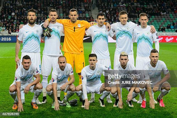 Slovenia's squad defender Bostjan Cesar, forward Milivoje Novakovic, goalkeeper Samir Handanovic, defender Branko Ilic, midfielder Josip Ilicic,...