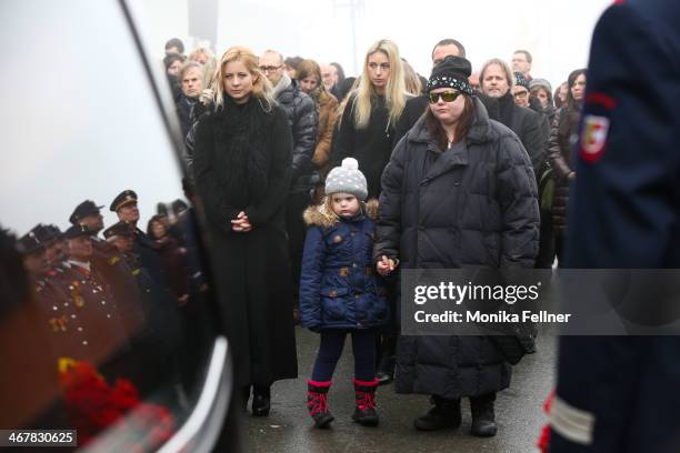 Widow Iva atends with daughter Nastassja ansd granddaughter Lea Magdalena the funeral service for actor Maximilian Schell at Pfarrkirche on February...